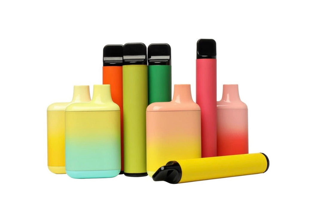 Assortment of colorful disposable vape devices in various shapes and gradient colors on white background. (Image courtesy of Freepik)
